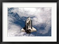 Framed STS-135 Atlantis during the Rendezvous Pitch Maneuver