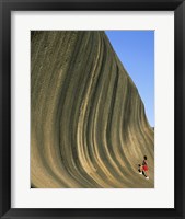 Framed Person climbing Wave Rock, Western Australia, Australia