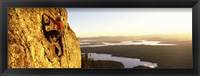 Framed Man climbing up a mountain, Rockchuck Peak, Grand Teton National Park, Wyoming, USA