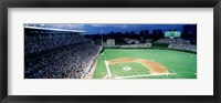 Framed Cubs baseball game under flood lights, USA, Illinois, Chicago