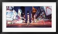 Framed Low angle view of sign boards lit up at night, Times Square, New York City, New York, USA