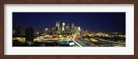 Framed Buildings lit up at night in a city, Minneapolis, Hennepin County, Minnesota, USA