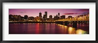 Framed Skyscrapers lit up at sunset, Willamette River, Portland, Oregon, USA