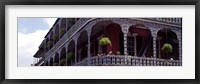 Framed People sitting in a balcony, French Quarter, New Orleans, Louisiana, USA