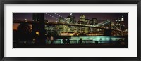 Framed Suspension bridge lit up at dusk, Brooklyn Bridge, East River, Manhattan, New York City, New York State, USA