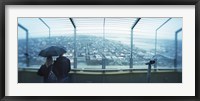 Framed Couple viewing a city from the Space Needle, Queen Anne Hill, Seattle, Washington State, USA