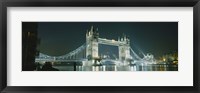 Framed Low angle view of a bridge lit up at night, Tower Bridge, London, England