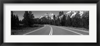 Framed Road Winding Through Teton Range, Grand Teton National Park, Wyoming, USA