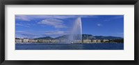 Framed Fountain in front of buildings, Jet D'eau, Geneva, Switzerland