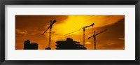 Framed Silhouette of cranes at a construction site, London, England