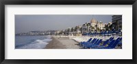 Framed Empty lounge chairs on the beach, Nice, French Riviera, France