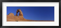 Framed Low angle view of a natural arch, Delicate arch, Arches National Park, Utah, USA