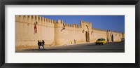 Framed Car on a road in front of a fortified wall, Medina, Kairwan, Tunisia