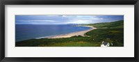 Framed Birds-eye view of sea, white stone cottage, Northern Ireland.