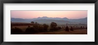 Framed Agricultural field with a mountain range in the background, Transylvania, Romania