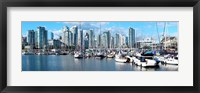 Framed Boats at marina with Vancouver skylines in the background, False Creek, British Columbia, Canada