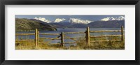 Framed Fence in front of a lake with mountains in the background, Lake General Carrera, Andes, Patagonia, Chile