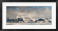 Framed Ice floes and storm clouds in the high arctic, Spitsbergen, Svalbard Islands, Norway