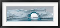 Framed Blue iceberg with hole, Antarctica