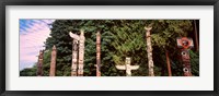 Framed Totem poles in a park, Stanley Park, Vancouver, British Columbia, Canada