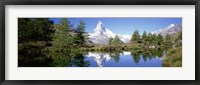 Framed Reflection of trees and mountain in a lake, Matterhorn, Switzerland