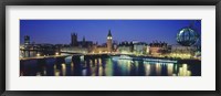 Framed Buildings lit up at dusk, Big Ben, Houses Of Parliament, Thames River, London, England