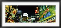 Framed Low angle view of buildings lit up at night, Shinjuku Ward, Tokyo Prefecture, Kanto Region, Japan