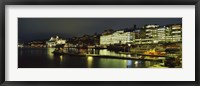 Framed Buildings in a city lit up at night, Sodermalm, Slussplan, Stockholm, Sweden