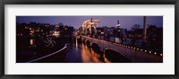 Framed Bridge lit up at night, Magere Brug, Amsterdam, Netherlands