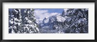 Framed Mountains and waterfall in snow, Tunnel View, El Capitan, Half Dome, Bridal Veil, Yosemite National Park, California