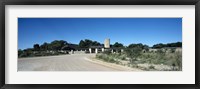 Framed Road leading towards the entrance of a rest camp, Okaukuejo, Etosha National Park, Kunene Region, Namibia