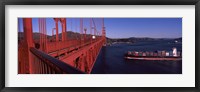 Framed Container ship passing under a suspension bridge, Golden Gate Bridge, San Francisco Bay, San Francisco, California, USA