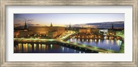 Framed Royal Palace and Parliament building lit up at dusk, Stockholm, Sweden