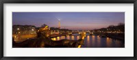 Framed Pont Alexandre III bridge with statue lit up at dusk, Seine River, Paris, Ile-De-France, France