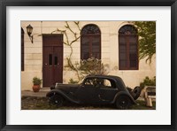 Framed Vintage car parked in front of a house, Calle De Portugal, Colonia Del Sacramento, Uruguay