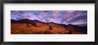 Framed Clouds over mountainous landscape at dusk, Montana, USA