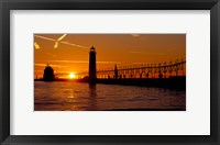 Framed Grand Haven Lighthouse at sunset, Grand Haven, Michigan, USA