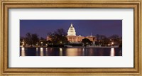 Framed Government building lit up at dusk, Capitol Building, National Mall, Washington DC, USA