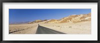Framed Road passing through mountains, Death Valley National Park, California, USA