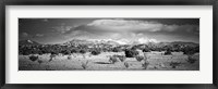 Framed High desert plains landscape with snowcapped Sangre de Cristo Mountains in the background, New Mexico (black and white)