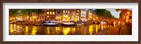 Framed Buildings along a canal at dusk, Amsterdam, Netherlands