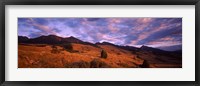 Framed Clouds over mountainous landscape at dusk, Montana, USA