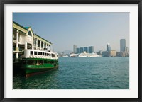 Framed Star ferry on a pier with buildings in the background, Central District, Hong Kong Island, Hong Kong