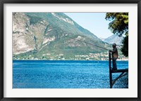 Framed Man Fishing from Dock on Edge of Lake Como, Varenna, Lombardy, Italy