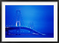 Framed Fog surrounding the Mackinac Bridge at dusk, Michigan, USA