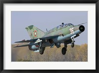 Framed Bulgarian Air Force MiG-21UM jet fighter taking off