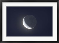 Framed Waxing crescent moon with Earthshine