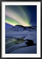 Framed Aurora Borealis over Mikkelfjellet Mountain in Troms County, Norway