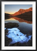 Framed Ice flakes in the shadows of Skittendalen Valley in Troms County, Norway