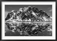 Framed Antarctica, Mountain peaks reflected in the Lemaire Channel.